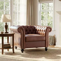 Zeus & Ruta Chesterfield Club Chair with Scrolled Arms, Nailhead Trim, and Solid Wood Legs