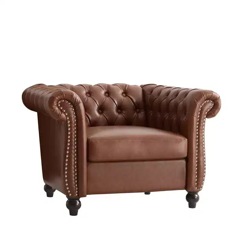 Fauteuil club Chesterfield avec accoudoirs arrondis, garniture cloutée et pieds en bois massif
