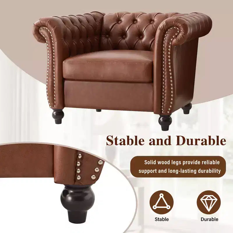 Fauteuil club Chesterfield avec accoudoirs arrondis, garniture cloutée et pieds en bois massif