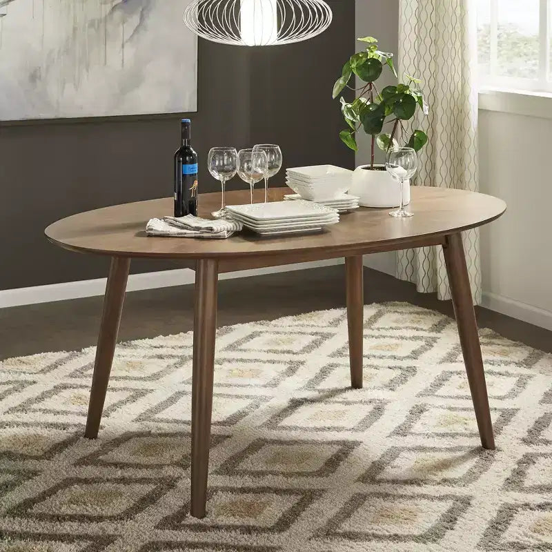 Table à manger ovale en noyer du milieu du siècle - Noyer
